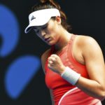 La tenista española Garbine Muguruza celebra su victoria ante la belga Kirsten Flipkens tras el partido que enfrentó a ambas en la segunda ronda del Abierto de Australia