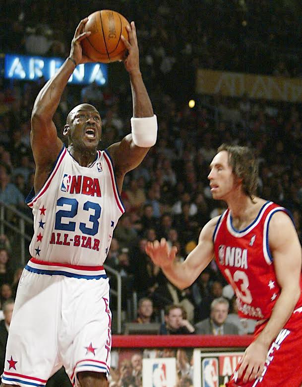 BKN-ALL STAR-JORDAN 5:JTH07 - 20030209 - ATLANTA, GA, UNITED STATES : NBA All-Star Michael Jordan (L) of the Washington Wizards drives to the basket past Steve Nash of the Dallas Mavericks, 09 February 2003, during the NBA All-Star game at Philips Arena in Atlanta, Georgia. Jordan started in place of Vince Carter who was voted onto the team, but elected to give Jordan his starting spot. BKN-ALL STAR-JORDAN 5:JTH07 - 20030209 - ATLANTA, GA, UNITED STATES : NBA All-Star Michael Jordan (L) of the Washington Wizards drives to the basket past Steve Nash of the Dallas Mavericks, 09 February 2003, during the NBA All-Star game at Philips Arena in Atlanta, Georgia. Jordan started in place of Vince Carter who was voted onto the team, but elected to give Jordan his starting spot.