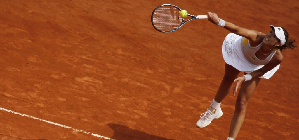 Garbiñe, durante un partido de tierra batida la temporada pasada | Foto: EFE Garbiñe, durante un partido de tierra batida la temporada pasada | Foto: EFE