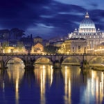 Night image of St. Peter's Basilica, Ponte Sant Angelo and Tiber