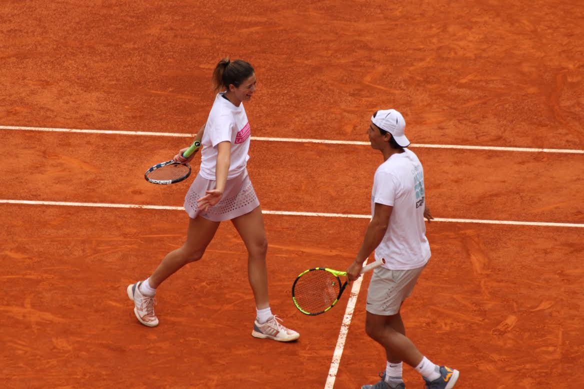 Rafa Nadal y Garbiñe Muguruza, durante un partido de dobles en Madrid | Foto: EFE