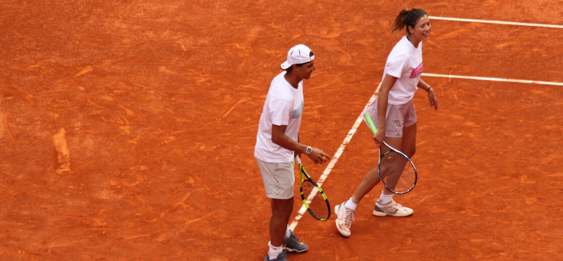 Rafa Nadal y Garbiñe Muguruza, durante un partido de dobles en Madrid | Foto: EFE