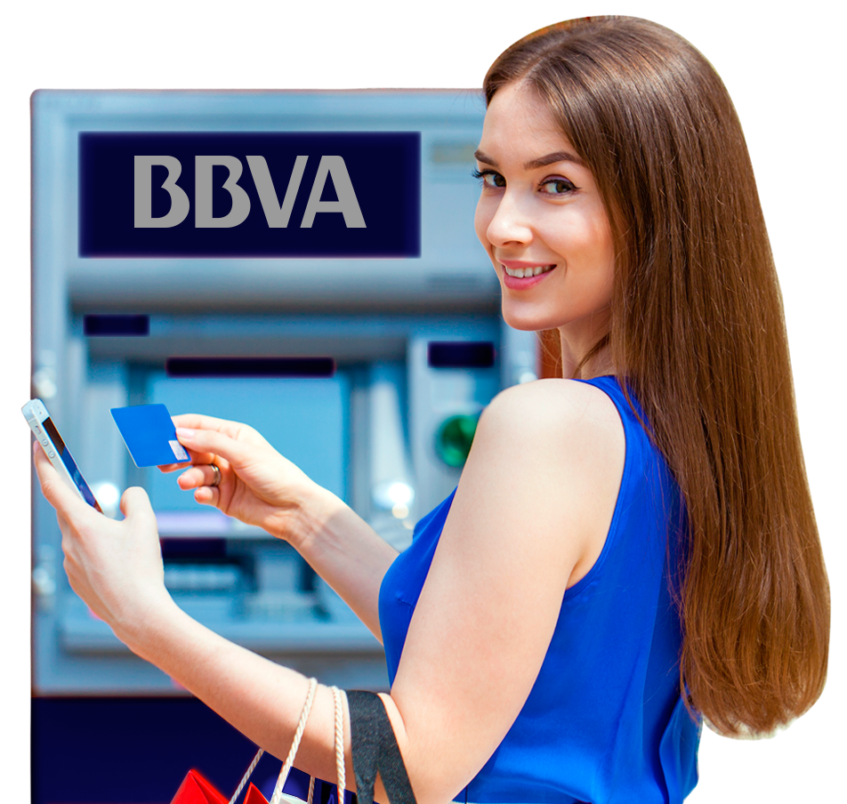 Mujer operando en un ATM Mujer en cajero