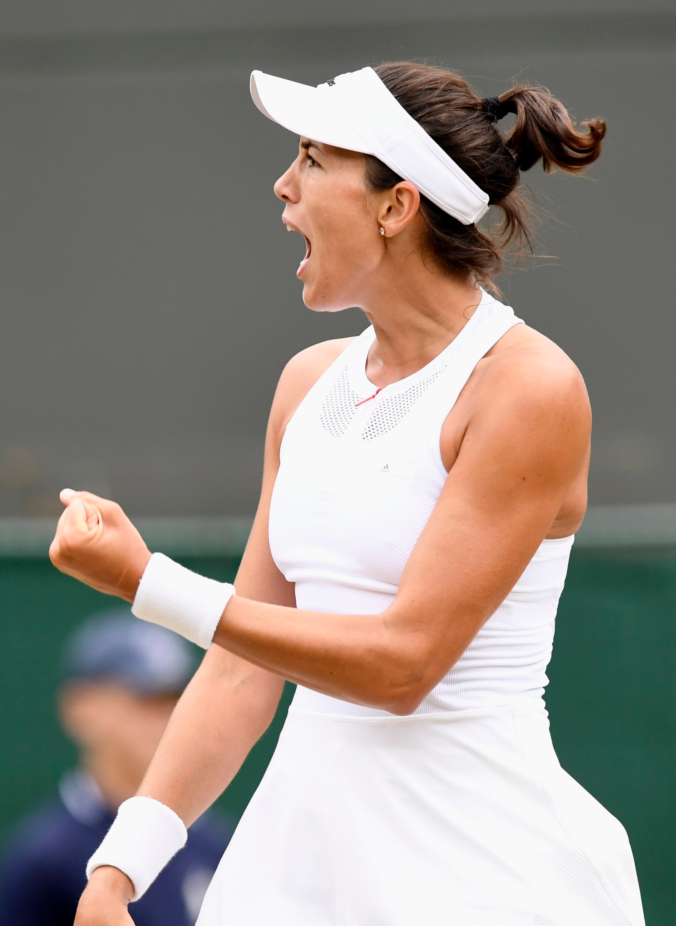Garbiñe Muguruza celebra la vicotria en los cuartos de Wimbledon