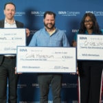 The top three winners in the U.S. for BBVA Momentum 2017. Chad Houser, center, of Dallas' Café Momentum won the top prize of $50,000; Margo Baines, right, of Houston's Chicks With Class won $25,000 for second place; and Andy Lovley of Dallas-based Education Opens Doors was awarded $5,000 for third place.