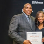 BBVA Compass Chief Talent & Culture Executive Rosilyn Houston receives recognition from Black Enterprise CEO Earl Graves at the publication's 2018 BBVA-Compass-Rosilyn-Houston-Black-Enterprise-Banner