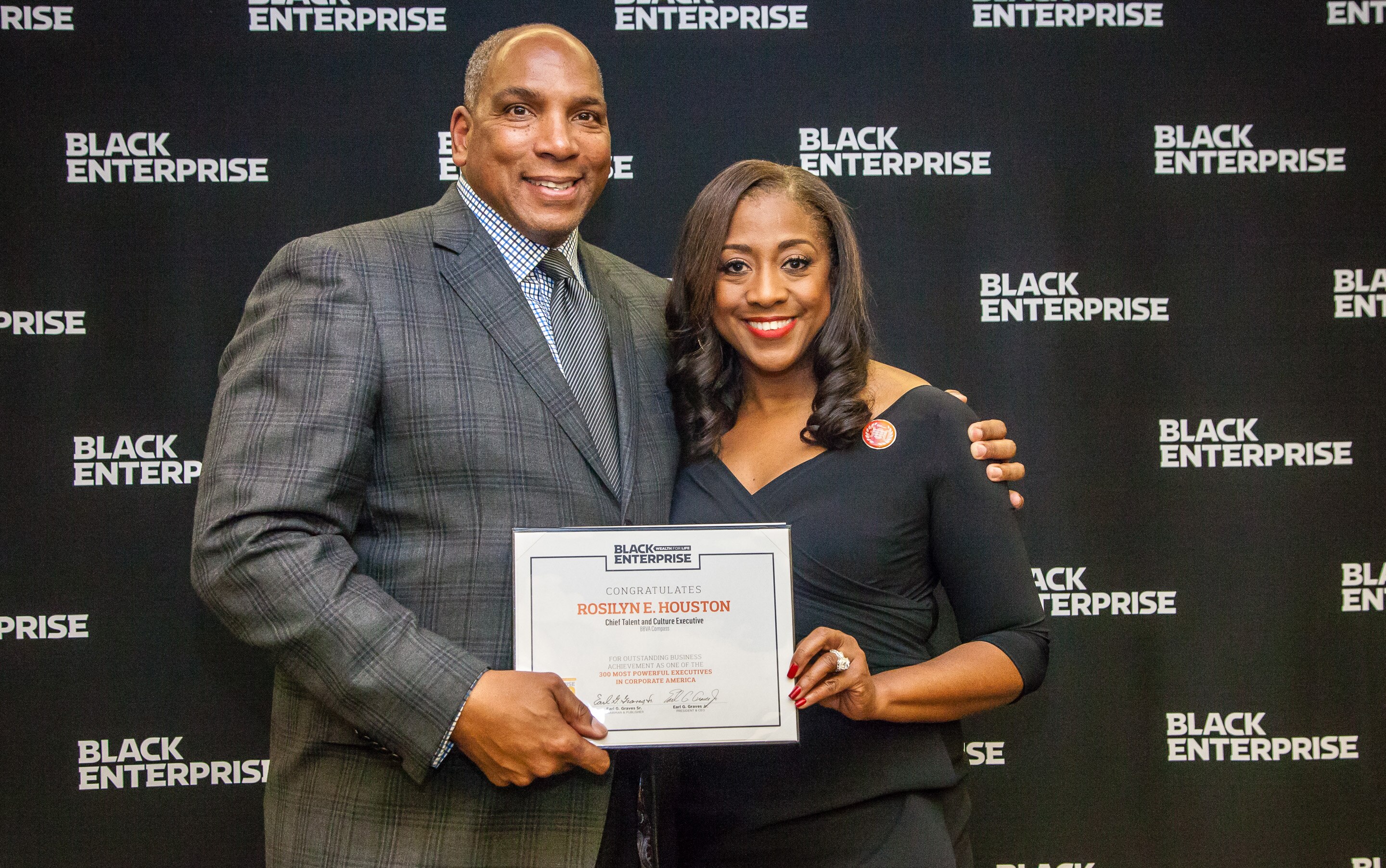 BBVA Compass Chief Talent & Culture Executive Rosilyn Houston receives recognition from Black Enterprise CEO Earl Graves at the publication's 2018 BBVA-Compass-Rosilyn-Houston-Black-Enterprise