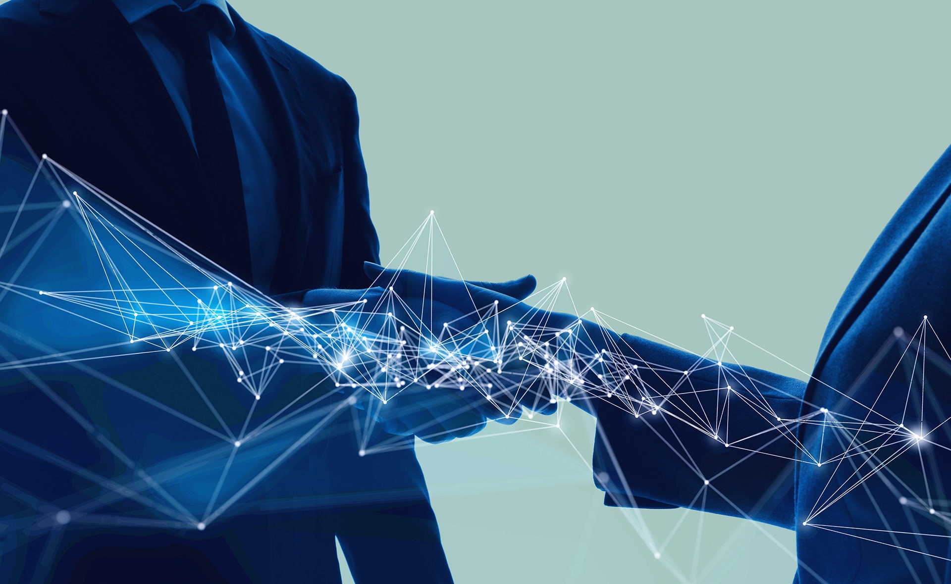 Fotografía de estrechar manos, cerrar un trato, blockchain, tecnología, préstamos corporativos BBVA