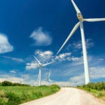 fotografia de molinos de viento a los lados de un camino BBVA