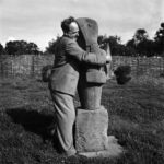 Henry Moore with his sculpture Mother and Child, Farley Farm, England, 1953