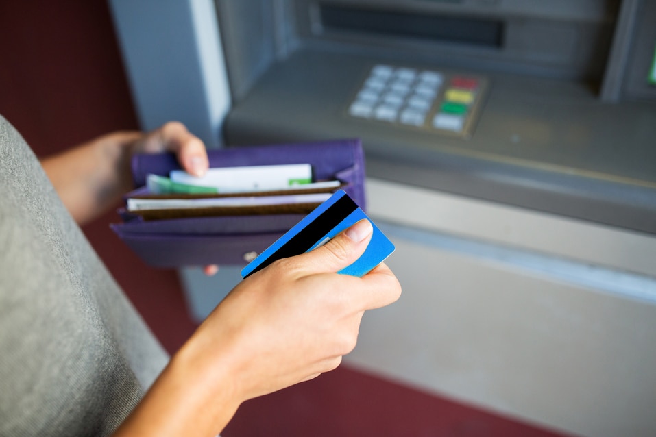 finance, money, bank and people concept - close up of hands with cash and credit card at atm machine finance, money, bank and people concept - close up of hands with cash and credit card at atm machine