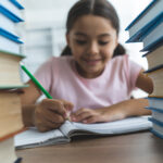 BBVA-programas-iniciativas-sociales-niña-estudiantes-colegios-libros-educación BBVA-programas-iniciativas-sociales-niña-estudiantes-colegios-libros-educación