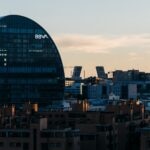 Madrid, Spain - October 31, 2020: View of the skyline of Madrid with Las Tablas residential district, BBVA office building and Cuatro Torres financial district at sunset. planeta-bbva-sostenibilidad-medioambiente-vela-cuatro-torres-Madrid-torresquio