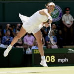 Fotografía de Garbiñe Muguruza devolviendo la pelota en WImbledon BBVA