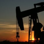 An oil rig at sunset in Texas. An oil rig at sunset.