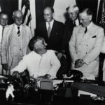 Roosvelt signing Banking Act in 1935