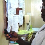 Image of anNurse_in_Ghana_using_mobile_phone