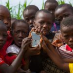 Image Kids with a mobile phone in Nairobi - Wikipedia Zero