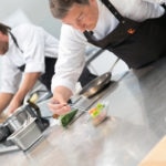 El Celler de Can Roca head chef Joan Roca plates Lobster Parmentier with Mole Sauce and Phytoplankton Sponge Cake Smoked with Spices.