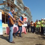 Tyler Dial performing in LA in front of construction workers.