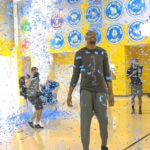 Kevin Durant walks into the gym at IDEA Rundberg