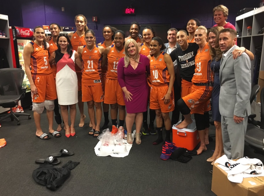 Holly Rowe with the Phoenix Mercury. Mercury with Holly Rowe
