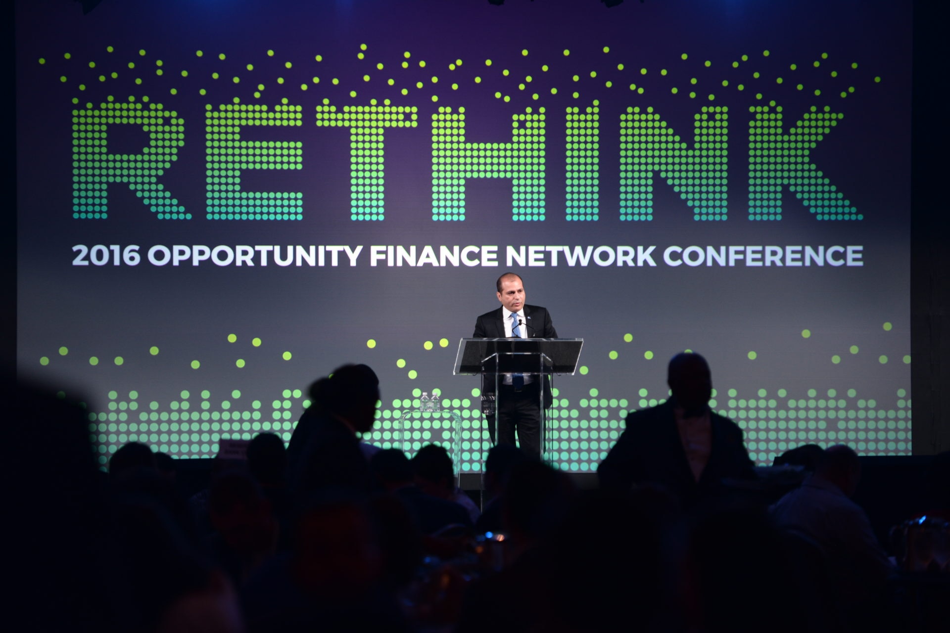 A photo of BBVA Compass Director of Corporate Responsibility and Reputation Rey Ocañas speaking at the 2016 Opportunity Finance Conference on Oct. 25, 2016.