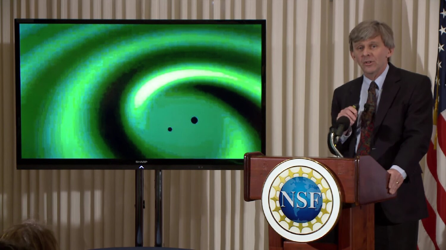Image of David Reitze, executive director of LIGO, speaks during the announcement that scientists have observed gravitational waves