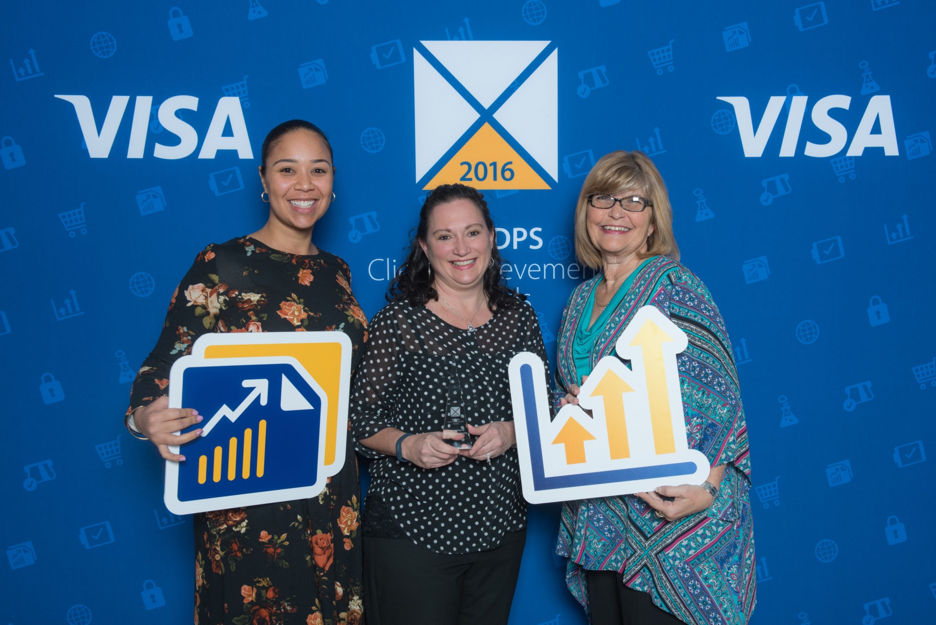 BBVA Compass' Melissa Smith (middle) and Wanda Birge (right) pose with Madolyn Street, Visa DSP Account Manager, at the 2016 Visa DPS Client Achievement award ceremony.