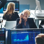 Workspace, computers, market charts, currencies Picture of workspace, computers, market charts, currencies, BBVA