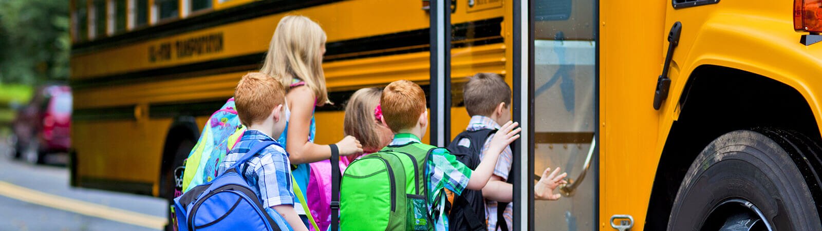 children-boarding-school-bus