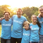 Volunteers take photo on a summer evening summer-volunteers