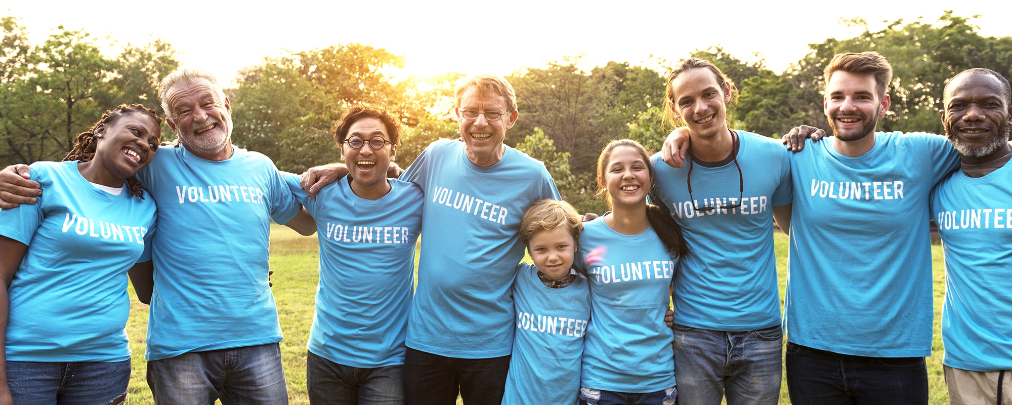Volunteers take photo on a summer evening summer-volunteers
